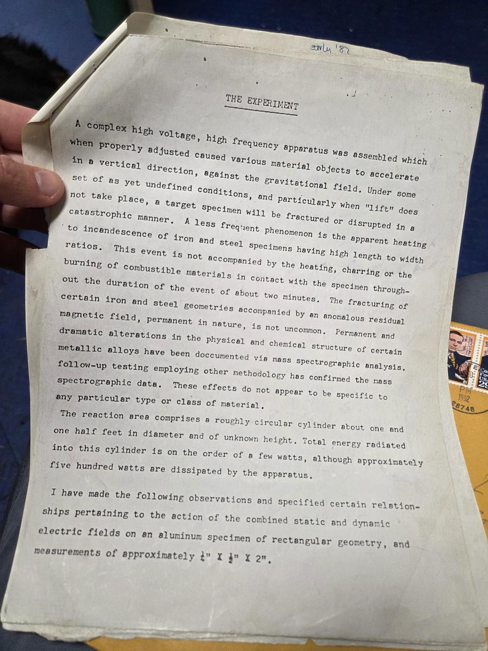 Typed page headed "The Experiment": a high voltage, high frequency apparatus lifts and fractures material specimens, with about five hundred watts dissipated by the apparatus.