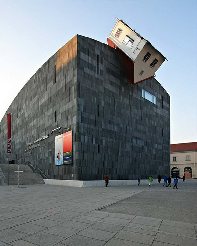 Hilarious House Stuck In Building